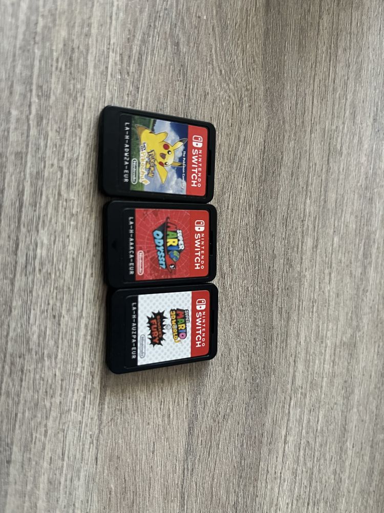 Nintendo Switch Lite + 3 gry