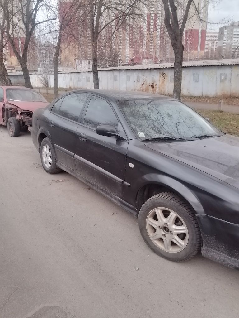 Шевроле Еванда 2.0