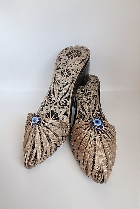 Srebrzone pantofle Plater, drewno, szkło oko proroka