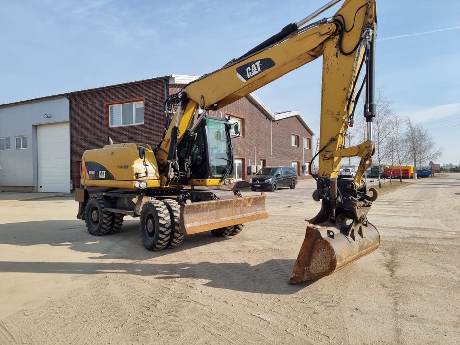 Продам колесный экскаватор Caterpillar М 316 D , 2012 г