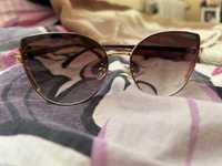Brązowe okulary przeciwsłoneczne ze złoceniami