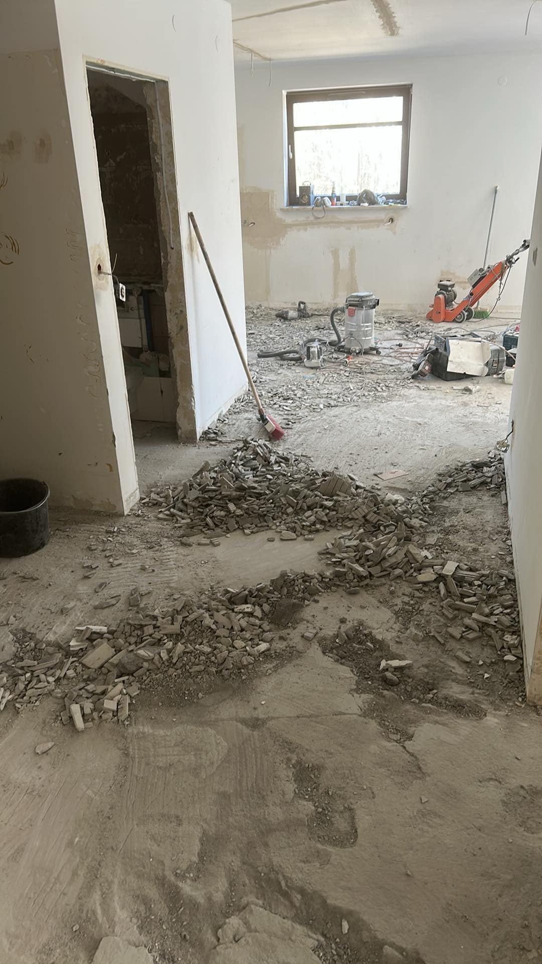 Obniżanie poziomu posadzek podłogi frezowanie betonu wylewki betonu