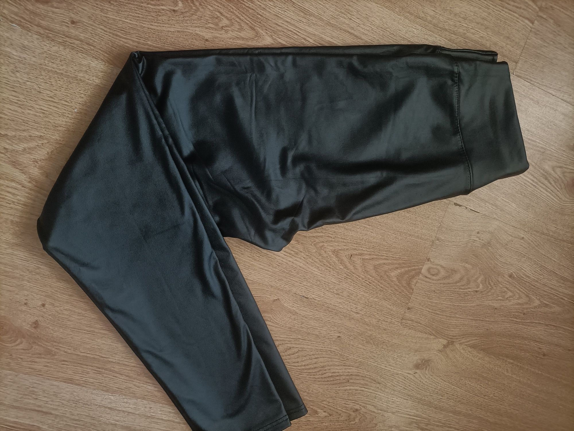 Woskowane spodnie z wysokim stanem nowe Butik