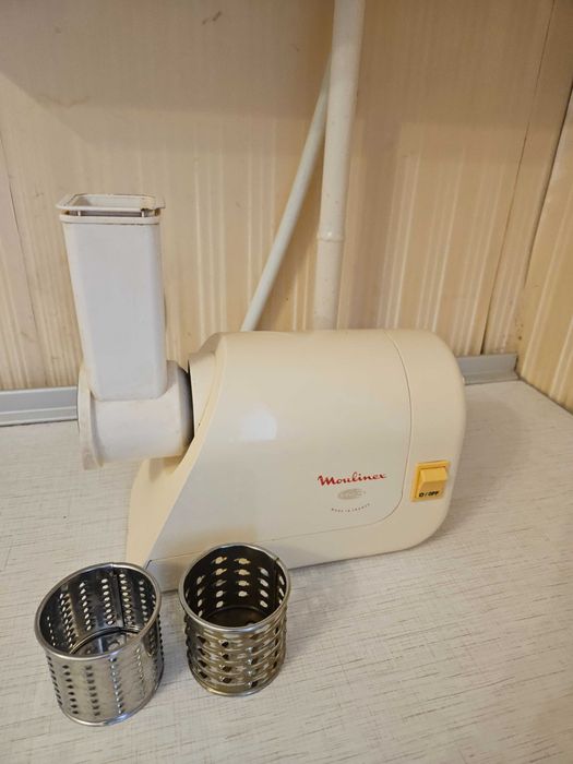 М'ясорубка Tefal з тертушками - подрібнювачами для овочів