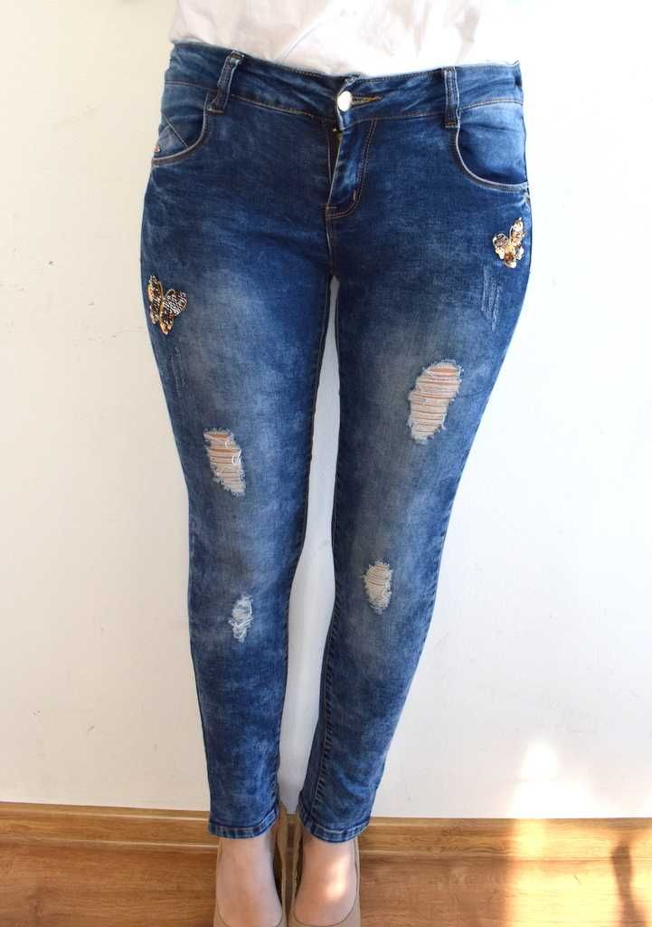 Spodnie rurki 164 xs s spodnie jeansy marmurki zdobione motylki