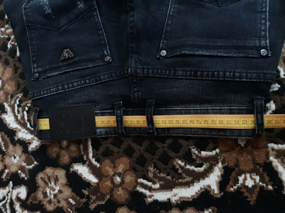 Нові джинси чорного кольору