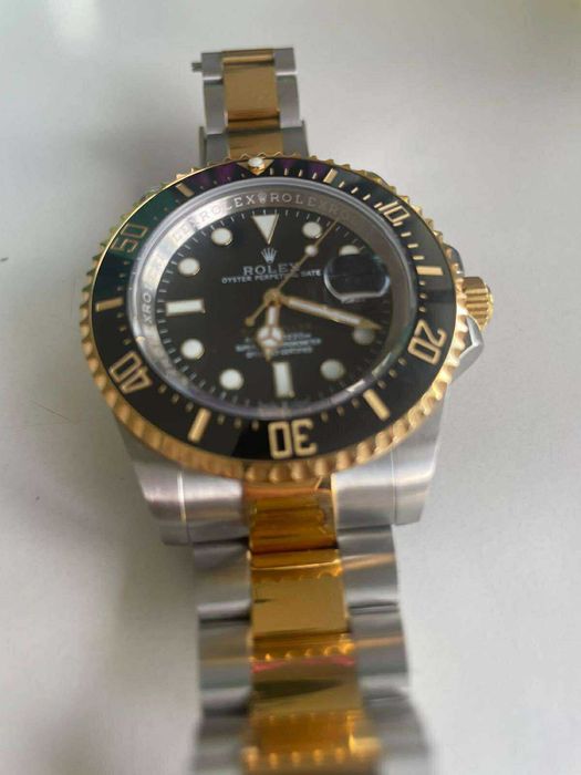 Zegarek Rolex czarno-złoty, stan doskonały