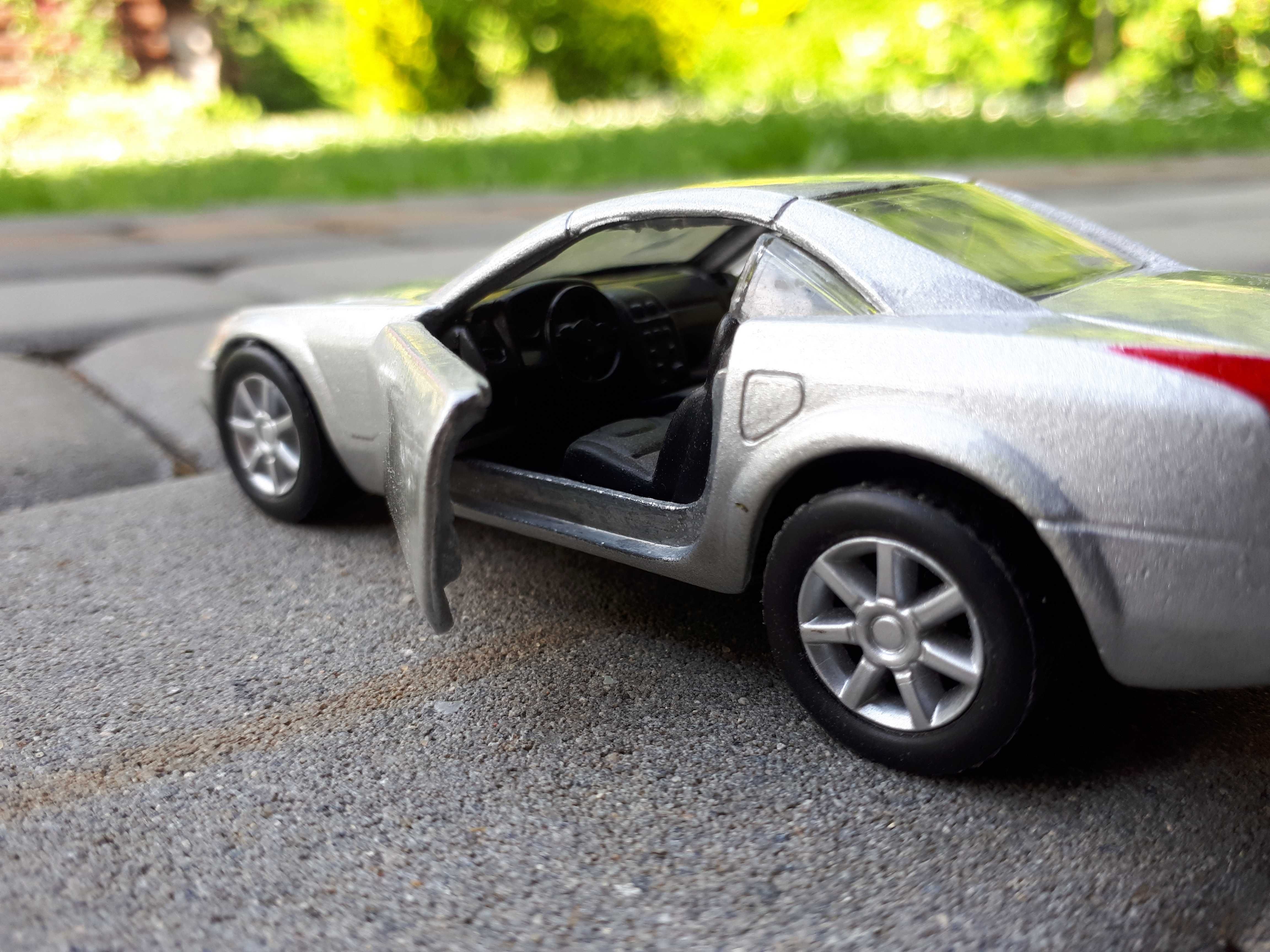 Cadillac EVOQ 1:37, czarne tablice
