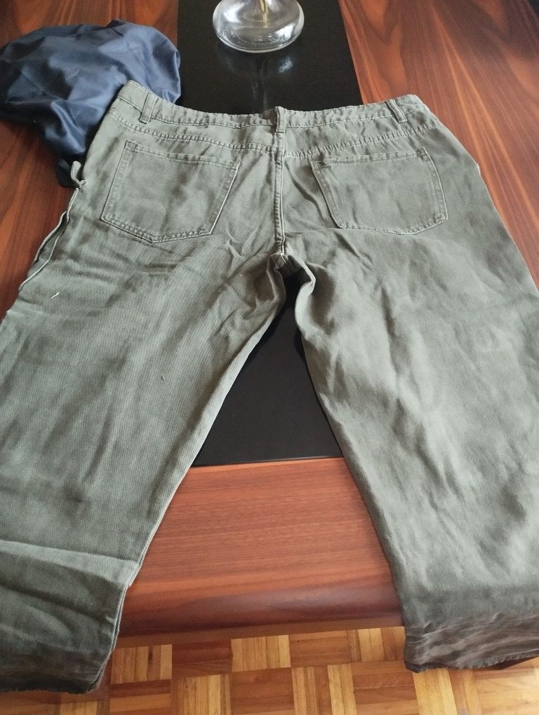 Calças ganga com bolsos laterais nova