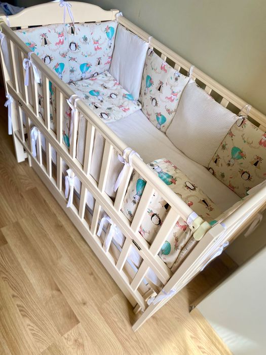 Дитяче ліжечко-манеж