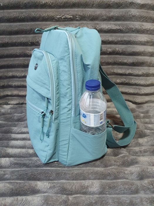 Mochila azul claro impermeável NOVA – ideal para viagem ou dia-a-dia