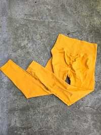 Damskie sportowe legginsy żółte pushup na siłownie rozmiar M