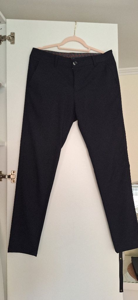 Granatowe spodnie garniturowe 33 s m