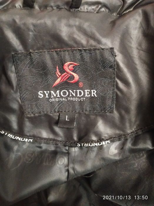 Продам женский пуховик