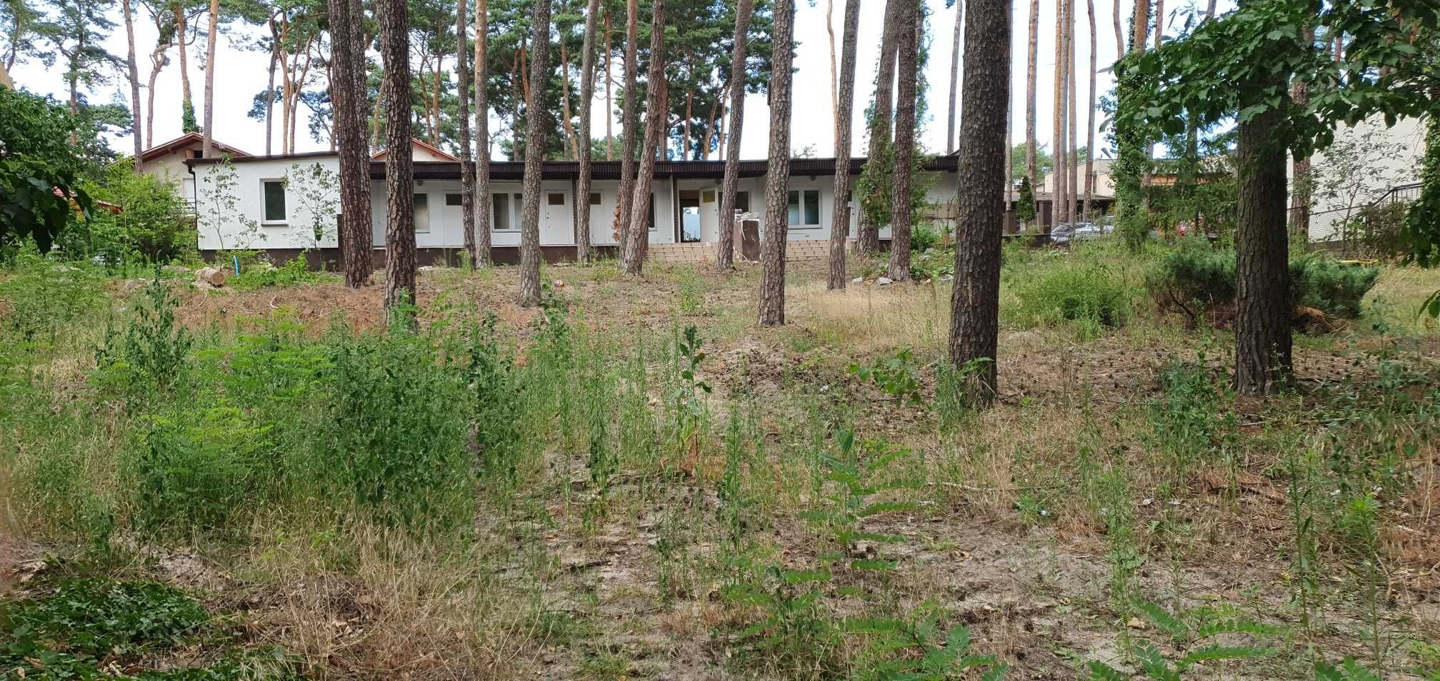 Sprzedam działkę budowlaną  z ośrodkiem nad jeziorem w Boszkowie