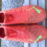 Chuteiras puma laranjas