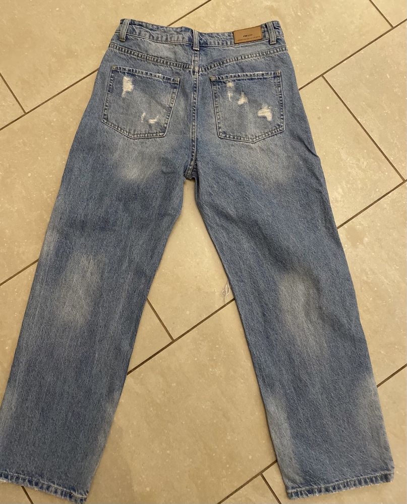 Damskie jeans, extra szerokie spodnie New Yorker  r. L/40 dziury