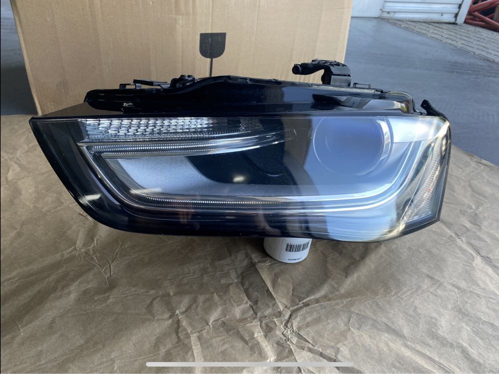 Farol Esq Audi A4