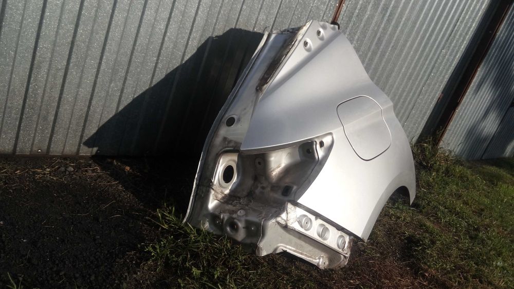 Opel Astra K V Błotnik tył tylny srebrny Z176 HB 5-drzwi
