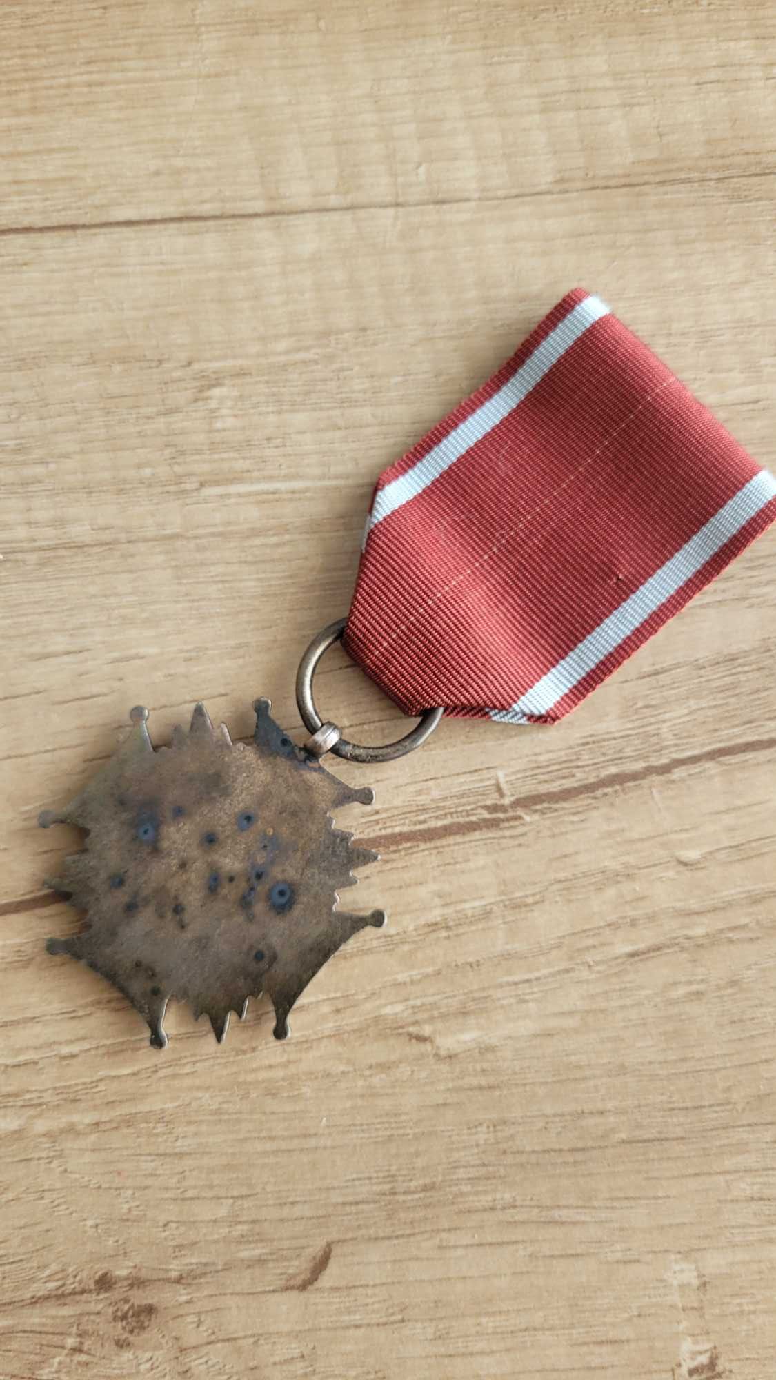 Medal Srebrny Krzyż Zasługi .