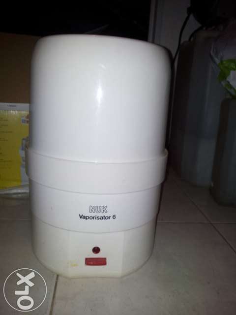 Vaporizador / esterilizador de biberons NUK