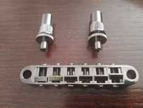 Mostek strun tube o matic firmy Gotoh (Cosmo black)