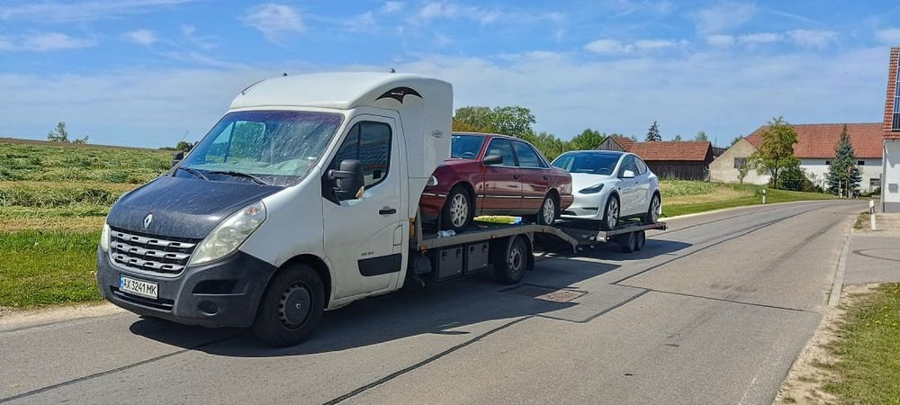 Услуги эвакуатора. Харьков Львов.