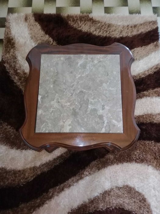 mesa de centro de sala com pedra de mármore