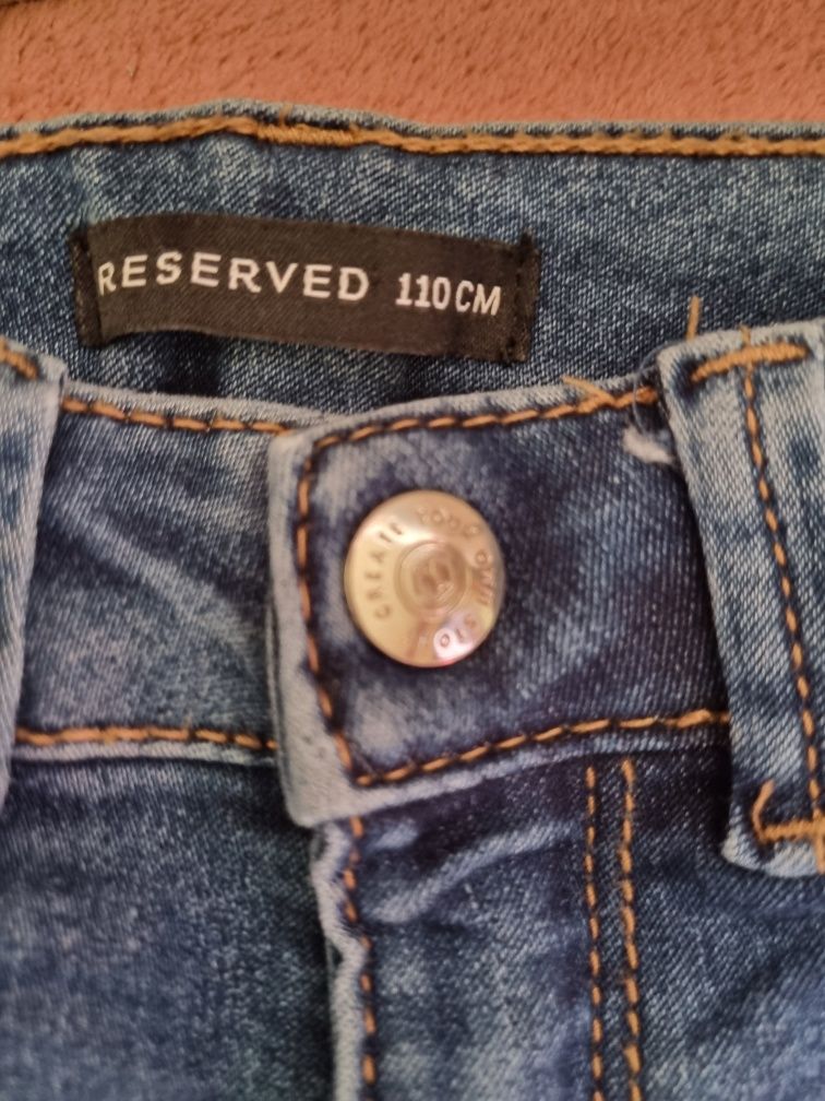 Śliczne spodnie jeansowe elastyczne dla dziewczynki Reserved roz.110