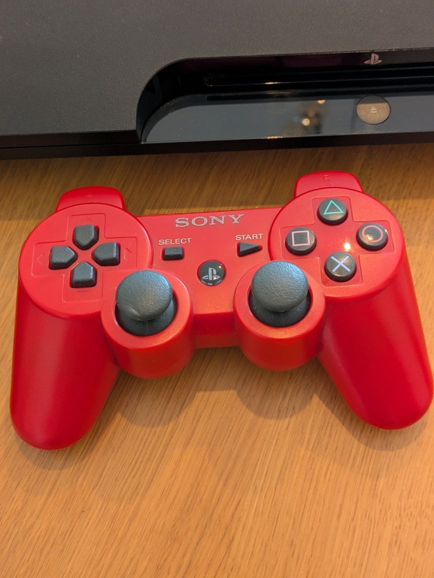 PlayStation 3 + 2 comandos + 9 jogos