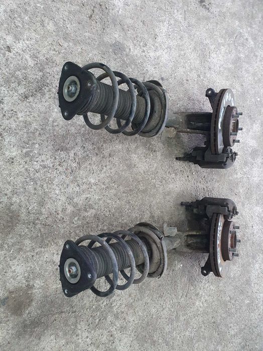 Amortyzator piasta zwrotnica spreżyna przód Ford Focus mk2 lift 1.4