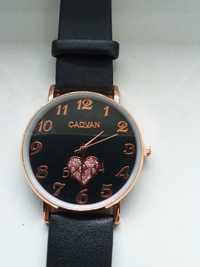 Śliczny zegarek  męski ,,Cadvan " modny Quartz  .