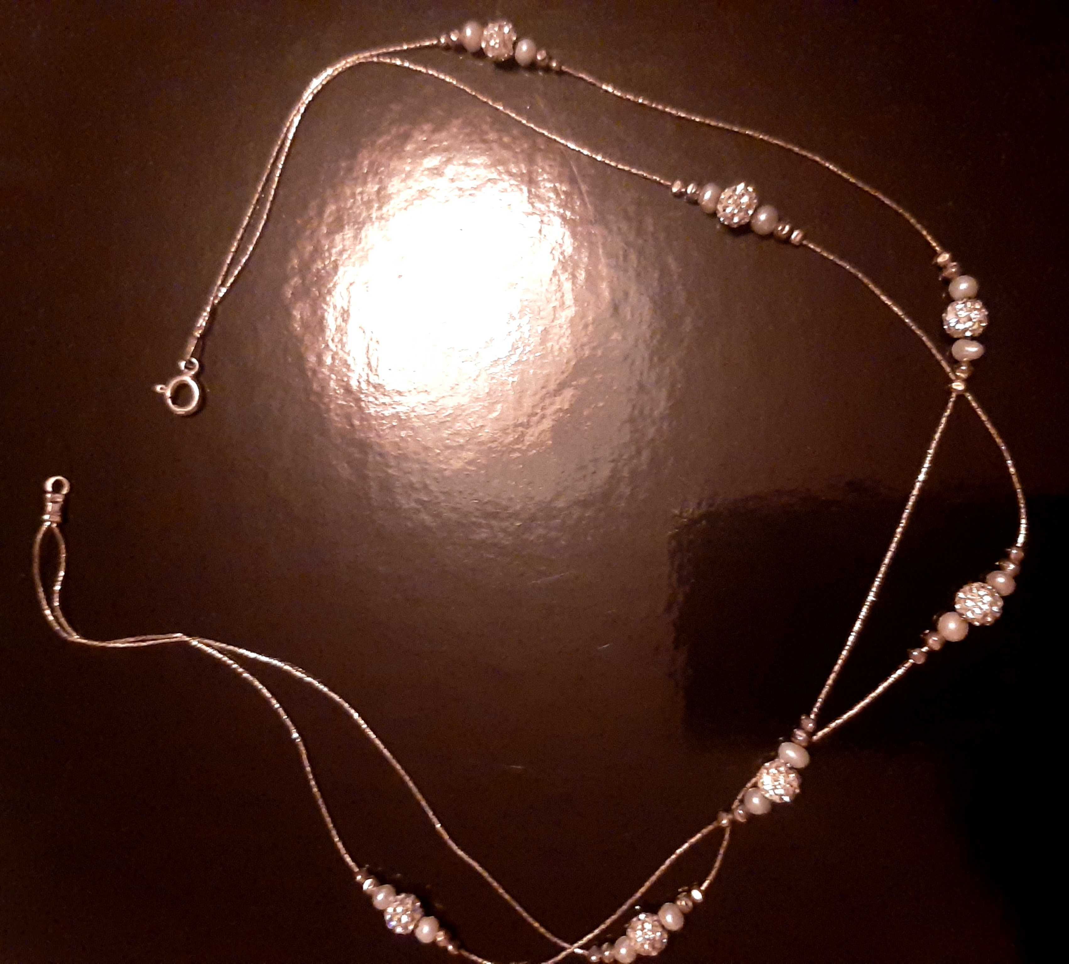 Conjunto de colar e pulseira em prata