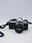 Nikon FE + Lente