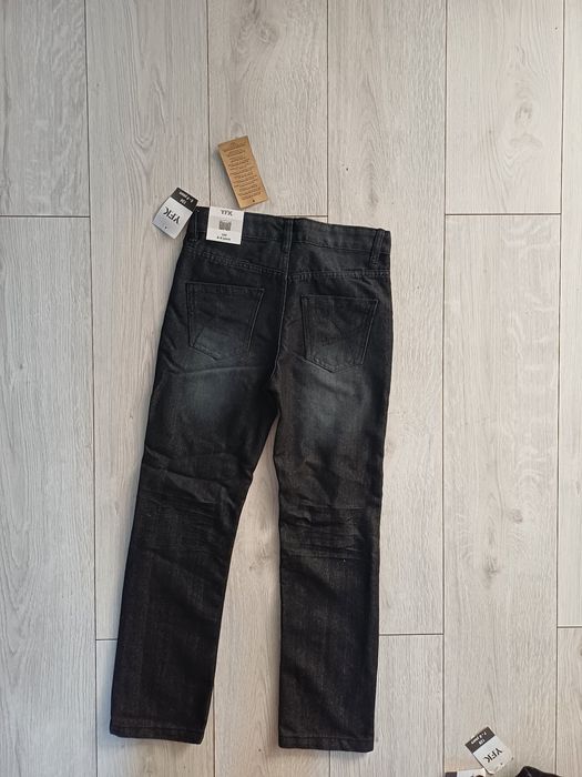 Nowe spodnie chłopięce r.134