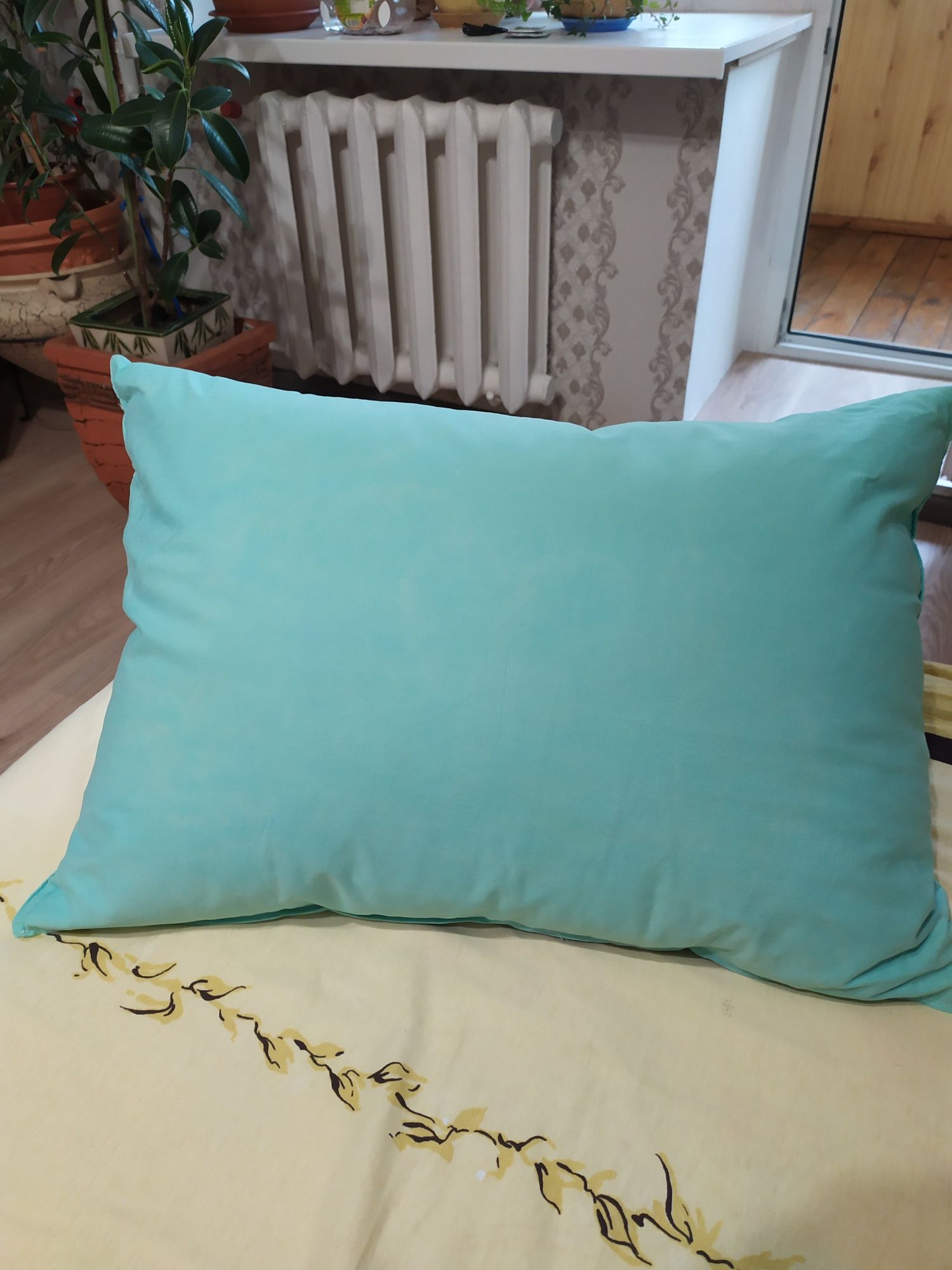 Подушки пір'яні як нові