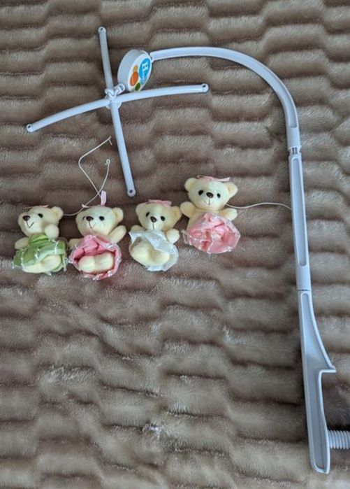 Карусель на ліжечко музична заводна з 4 плюшевими підвісками