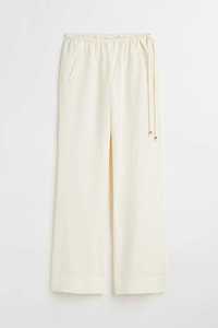 Szerokie spodnie damskie lyocell plus size kremowe