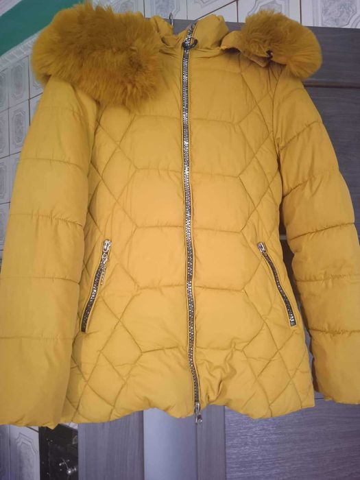 Курточка  в ідеальному  стані 44-46 розмір