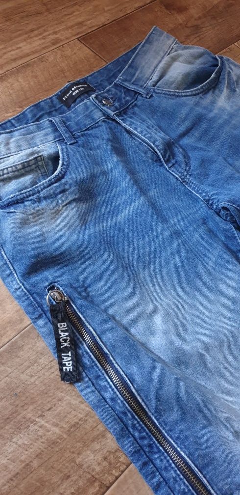 Męskie spodnie jeansowe Reserved W32 L32