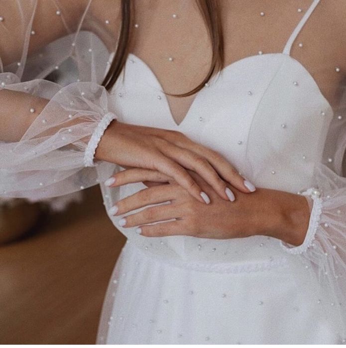 Елегантна весільна сукня