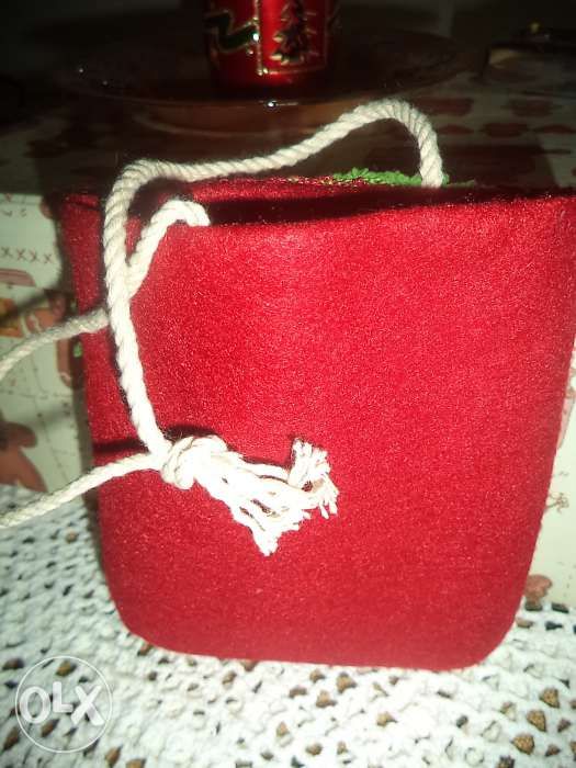 Pequena bolsa em tecido com o Pai Natal