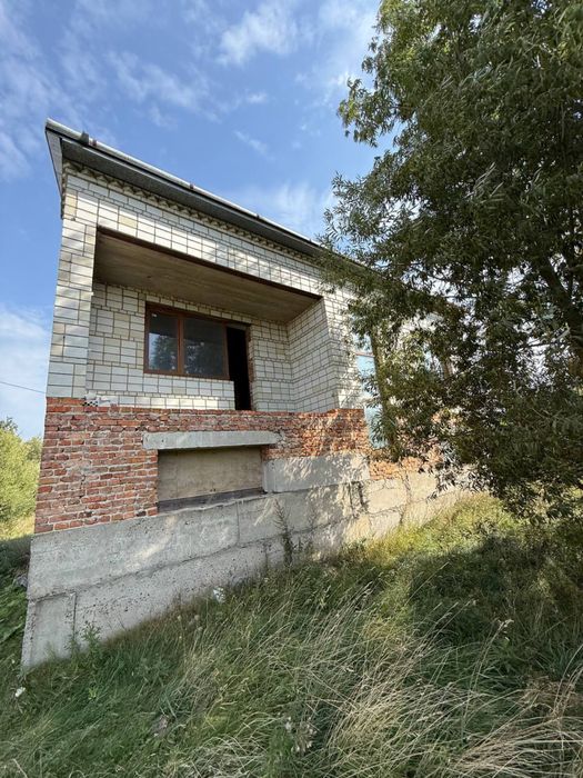 Продаж будинку + земельна ділянка біля Жовкви