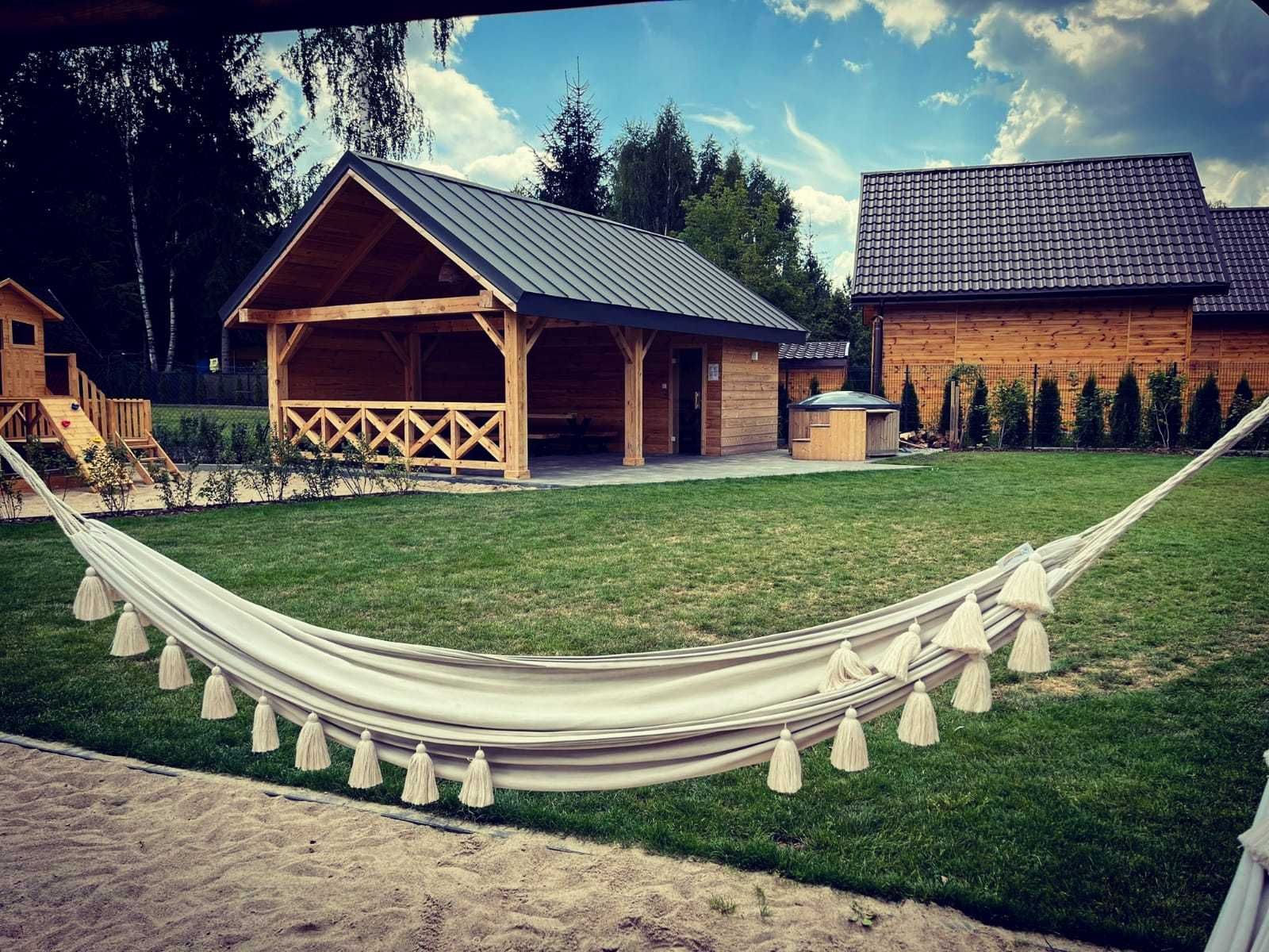Domek z jacuzzi i sauną nad jeziorem Okuninka | J.Białe