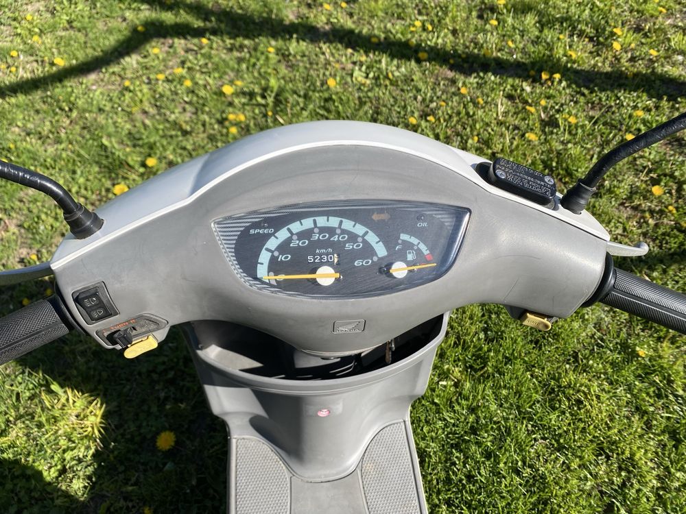Скутер honda tact