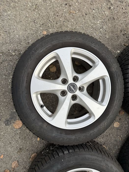Felgi aluminiowe 5x105 z oponami zimowymi 205/60R16 Opel Astra J ET40
