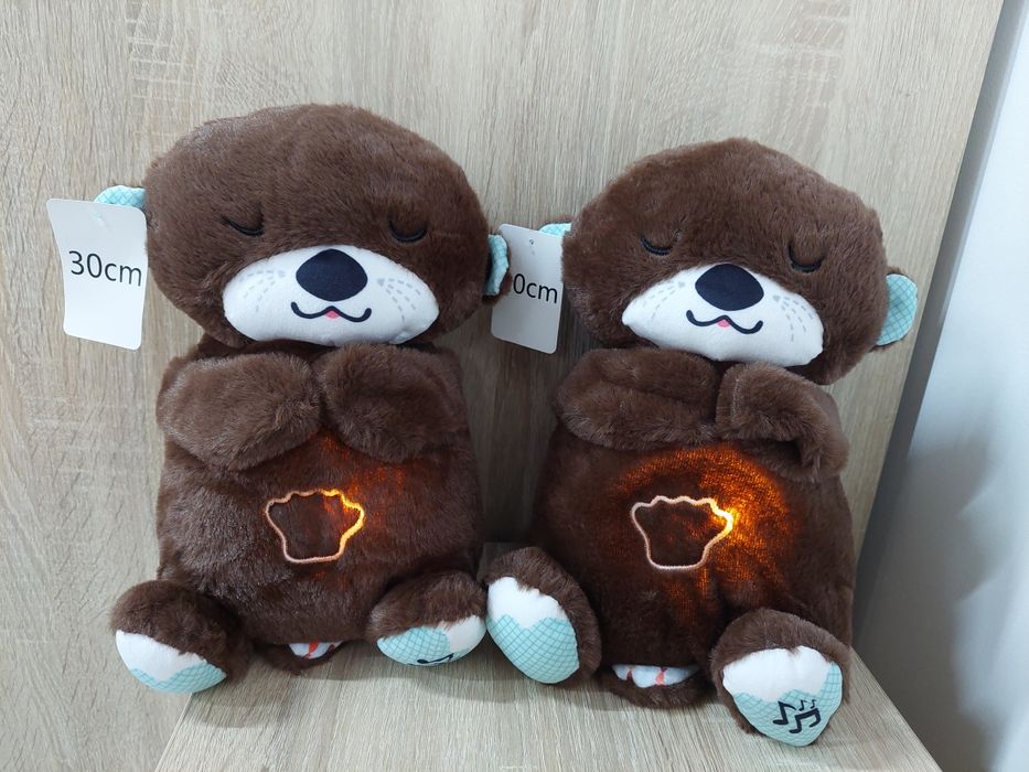 Мішка дихаючий, що світиться і грають мелодії