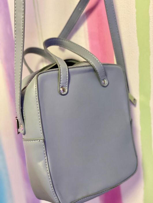 Блакитна сумка з ремінцем