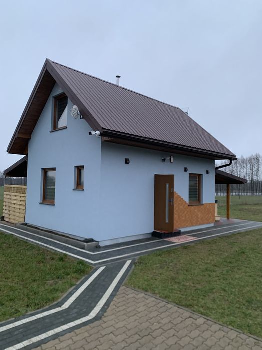 Domek całoroczny nad jeziorem z balią.