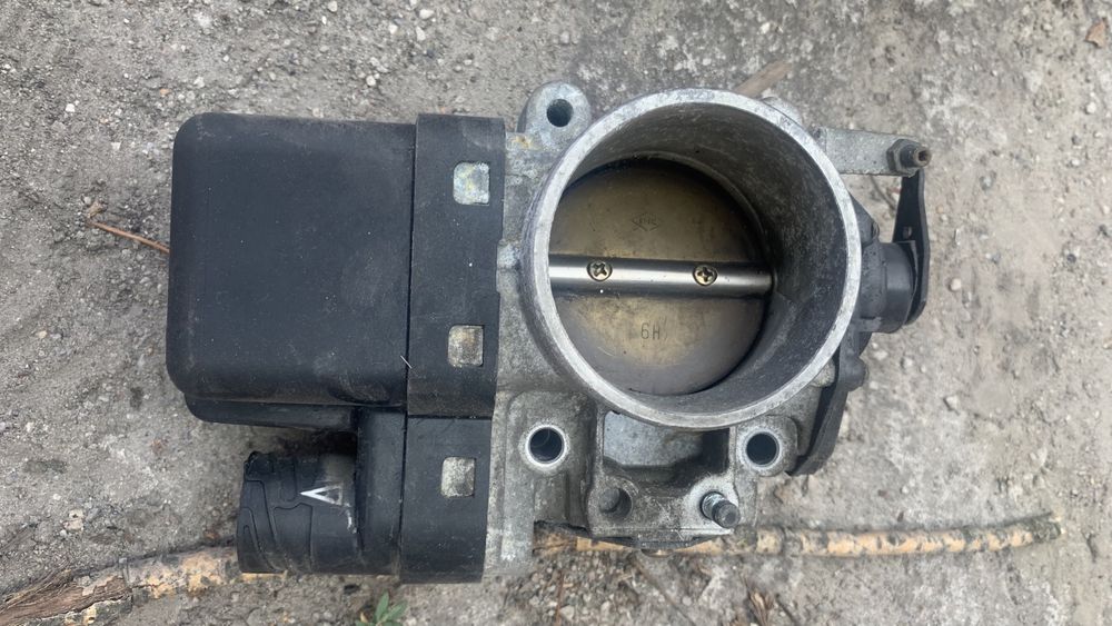Дроссельная заслонка BMW E46 E39 E38 M52TU 1433414 hella 007623